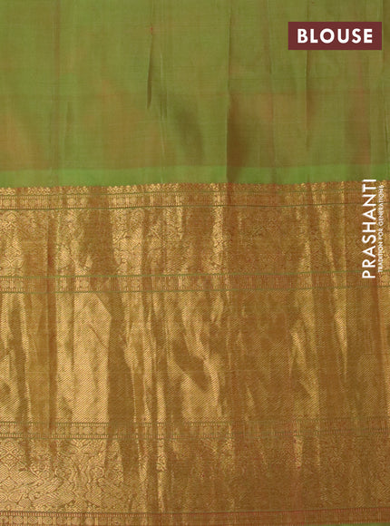 Gadwal silk saree dual shade of purple and dual shade of green with zari woven brocade weaves and long zari woven border