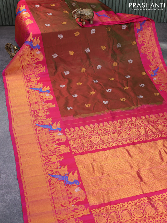 Gadwal silk saree dual shade of reddish green and dark pink with silver & gold zari woven buttas and long zari woven border