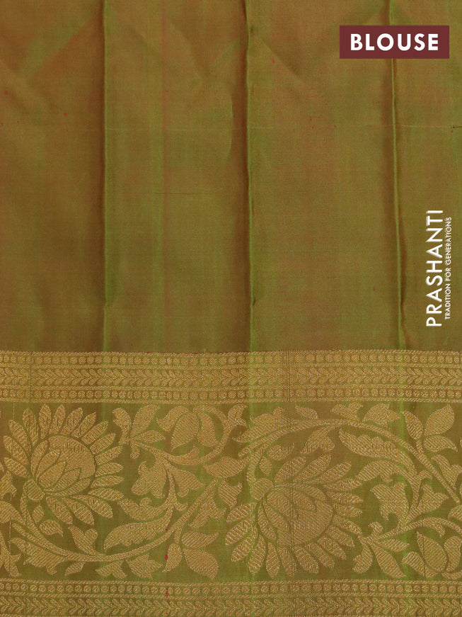 Gadwal silk saree reddish orange and dual shade of green with allover zari woven brocade weaves and long floral zari woven border