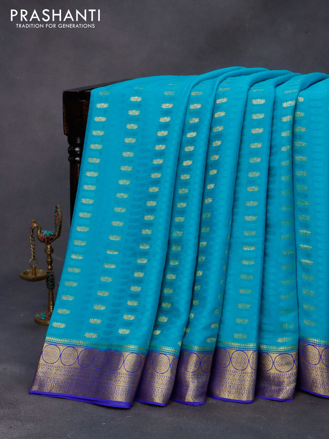 Pure mysore silk saree teal blue and royal blue with allover self emboss & zari buttas and zari woven border