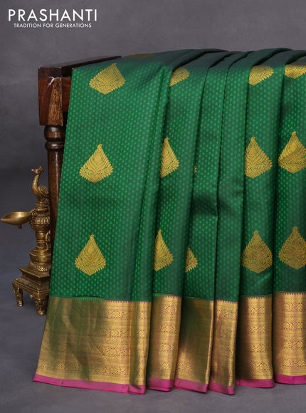 Pure kanchipuram silk saree dark green and pink with allover self emboss & zari buttas and zari woven border