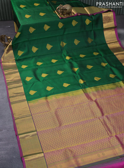 Pure kanchipuram silk saree dark green and pink with allover self emboss & zari buttas and zari woven border