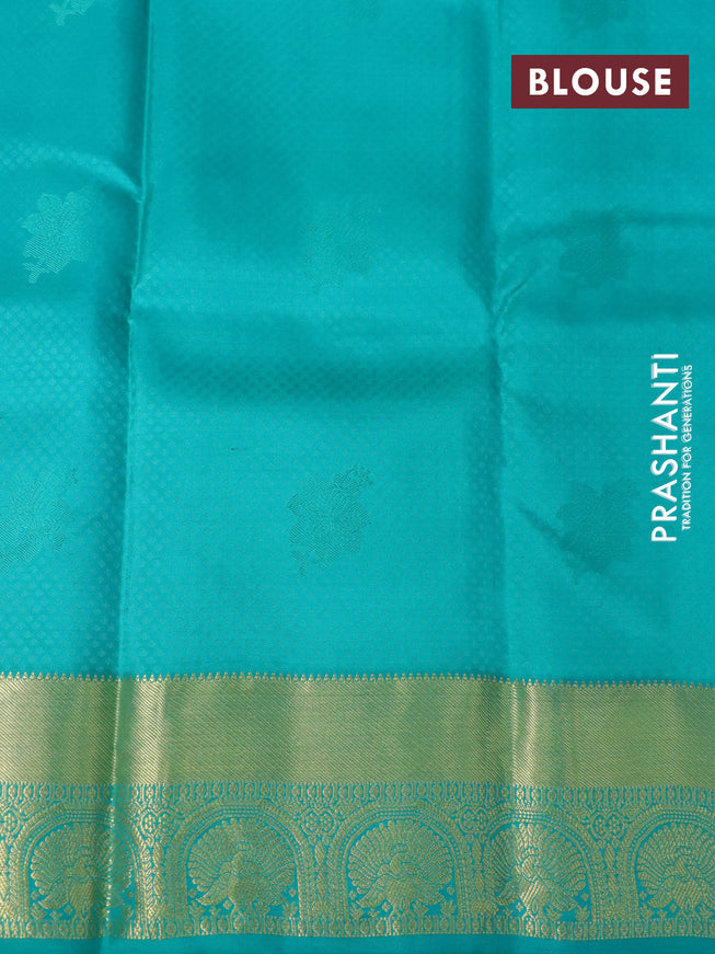 Pure kanchipuram silk saree dual shade of mango yellow and teal green with allover self emboss & zari buttas and zari woven border