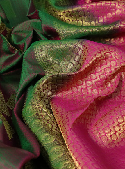 Pure kanchipuram silk saree dual shade of greenish pink and pink with allover self emboss & zari buttas and zari woven butta border