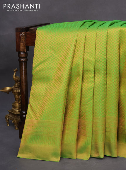 Pure kanchipuram silk saree light green and navy blue with allover copper zari woven brocade weaves and copper zari woven border