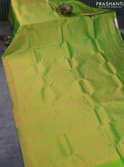 Pure kanchipuram silk saree light green and navy blue with allover copper zari woven brocade weaves and copper zari woven border