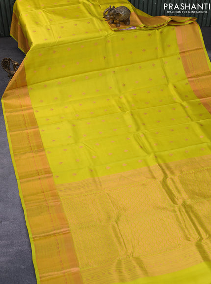 Pure kanchipuram silk saree lime yellow with copper zari woven buttas and copper zari woven border