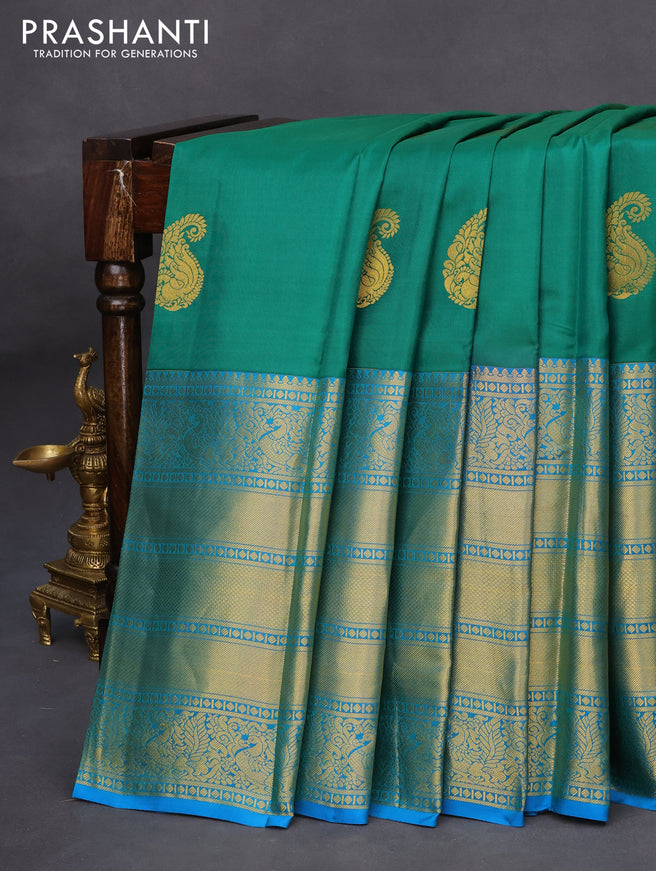 Pure kanchipuram silk saree green and cs blue with zari woven paisley buttas and long annam zari woven border