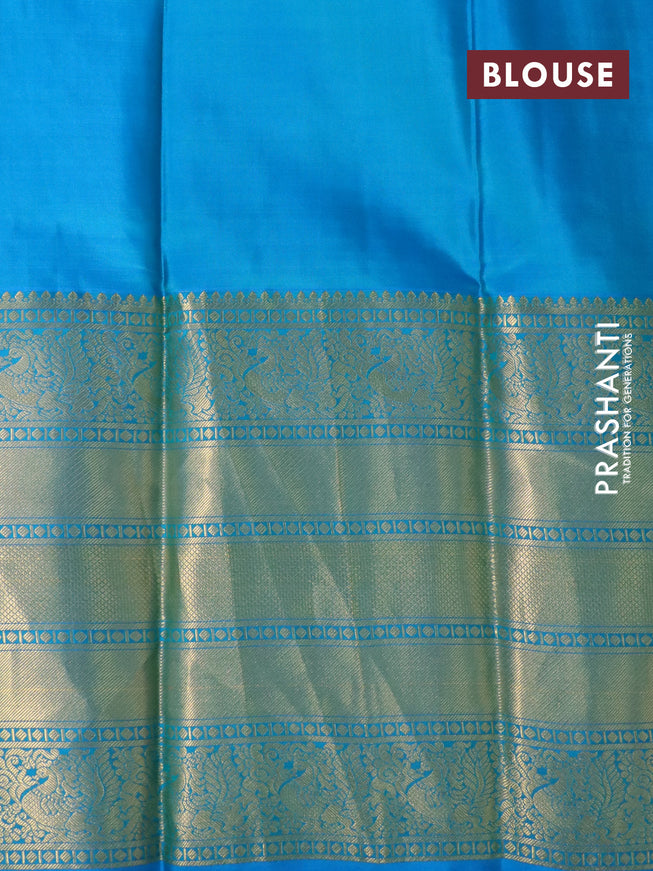 Pure kanchipuram silk saree green and cs blue with zari woven paisley buttas and long annam zari woven border