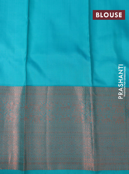 Pure kanchipuram silk saree cream and teal blue with allover copper zari weaves and long copper zari woven border