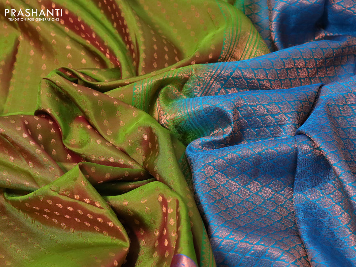 Pure kanchipuram silk saree dual shade of green and cs blue with allover zari woven butta weaves and copper zari woven annam border