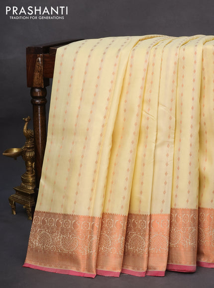 Pure kanchipuram silk saree cream and pink with allover copper zari woven butta weaves and copper zari woven border