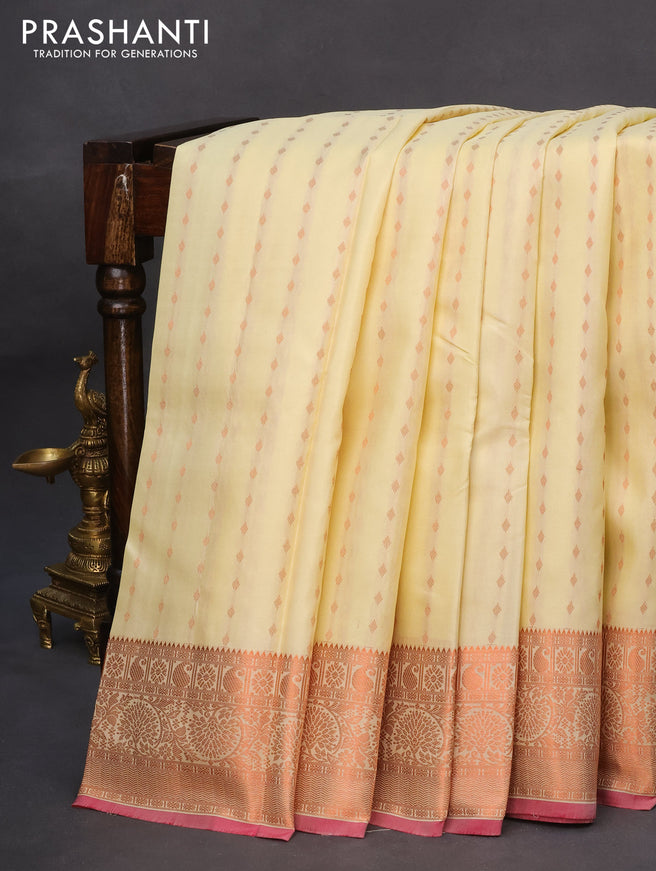 Pure kanchipuram silk saree cream and pink with allover copper zari woven butta weaves and copper zari woven border