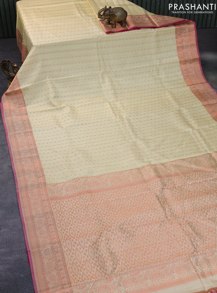 Pure kanchipuram silk saree cream and pink with allover copper zari woven butta weaves and copper zari woven border