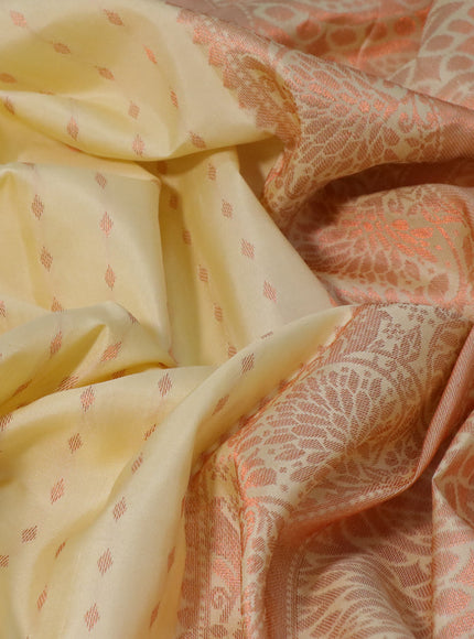 Pure kanchipuram silk saree cream and pink with allover copper zari woven butta weaves and copper zari woven border