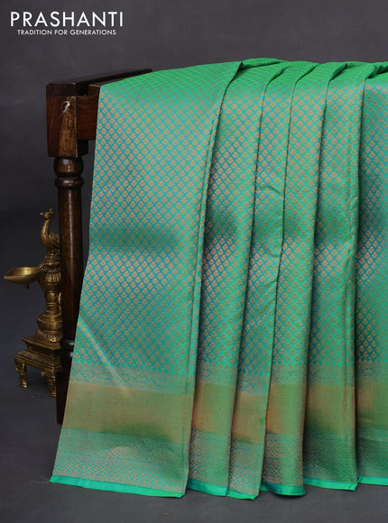 Pure kanchipuram silk saree dual shade of green and dark green with allover zari woven brocade weaves and zari woven border