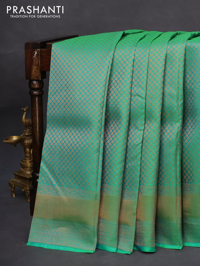 Pure kanchipuram silk saree dual shade of green and dark green with allover zari woven brocade weaves and zari woven border