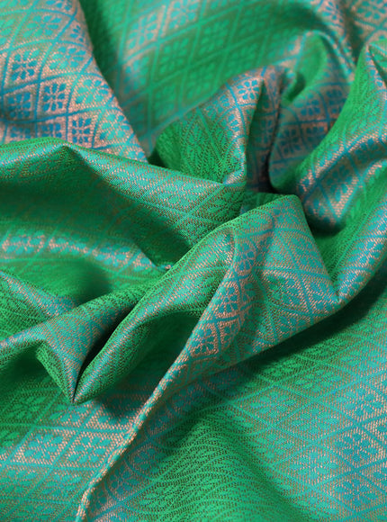 Pure kanchipuram silk saree dual shade of green and dark green with allover zari woven brocade weaves and zari woven border