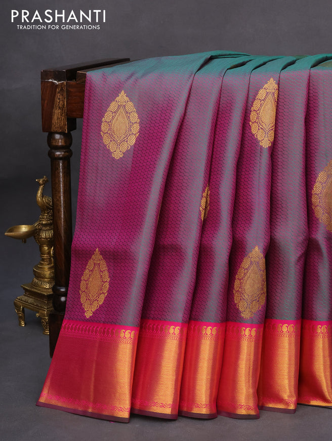 Pure kanchipuram silk saree dual shade of greenish pink and pink with allover self emboss & zari buttas and zari woven border