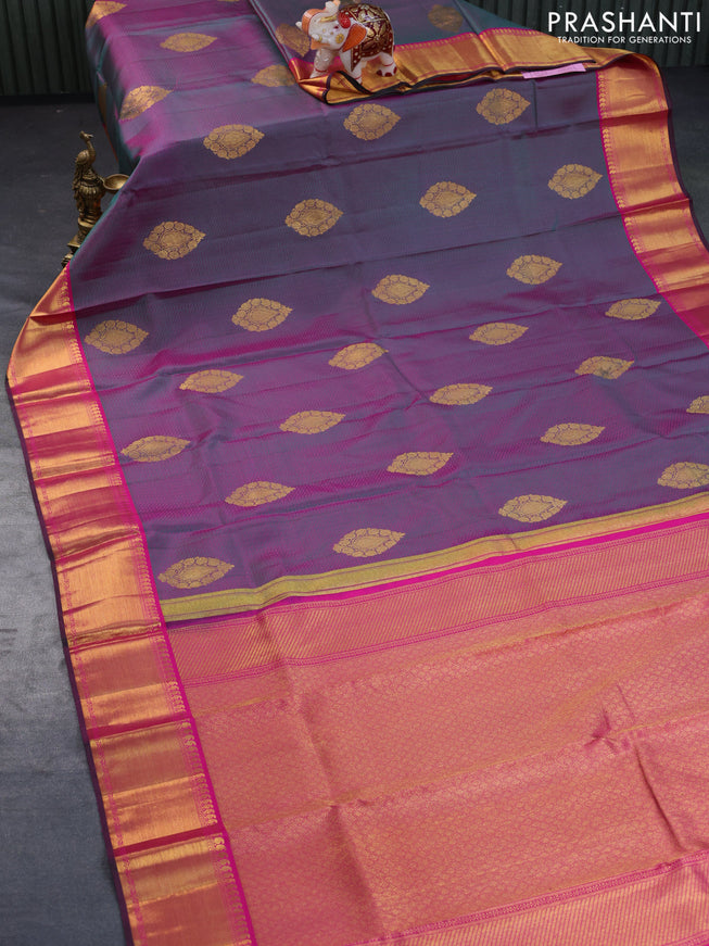 Pure kanchipuram silk saree dual shade of greenish pink and pink with allover self emboss & zari buttas and zari woven border