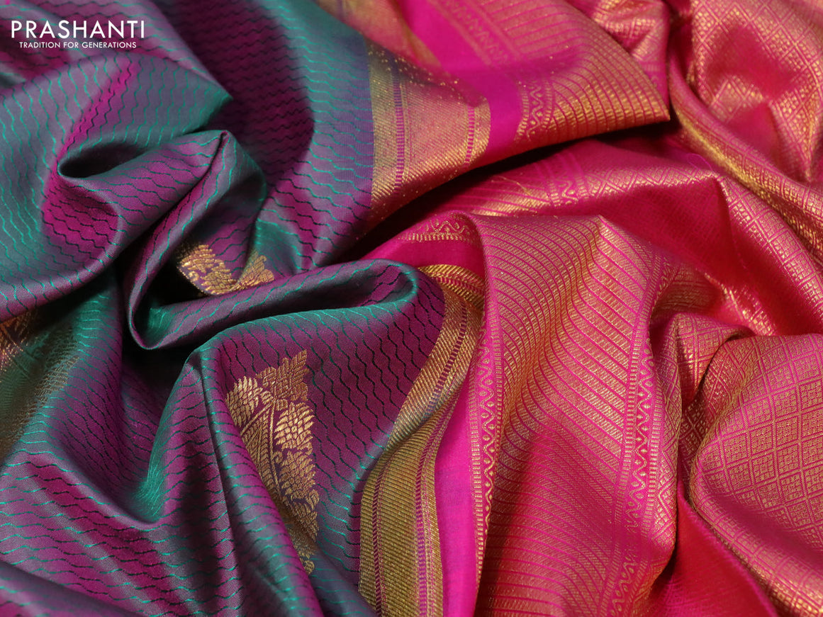 Pure kanchipuram silk saree dual shade of greenish pink and pink with allover self emboss & zari buttas and zari woven border