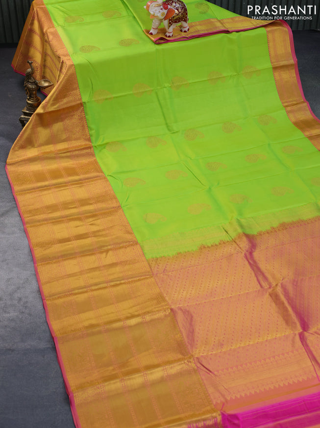 Pure kanchipuram silk saree light green and pink with zari woven paisley buttas and long zari woven annam border