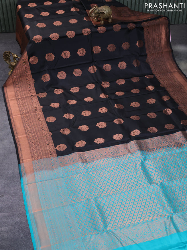 Pure kanchipuram silk saree black and teal blue with copper zari woven buttas and copper zari woven border