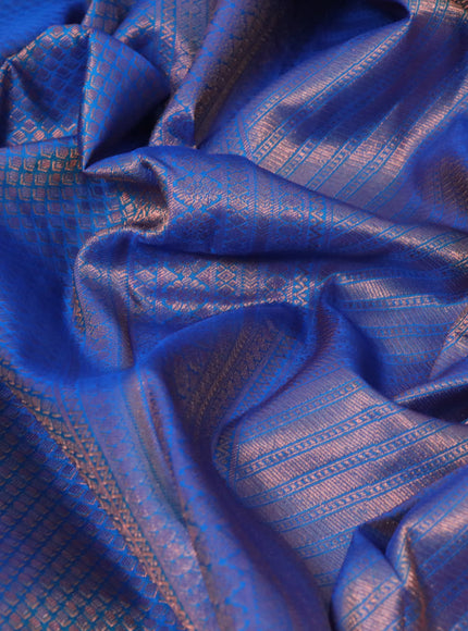 Pure kanchipuram silk saree cs blue with allover zari woven brocade weaves and copper zari woven border