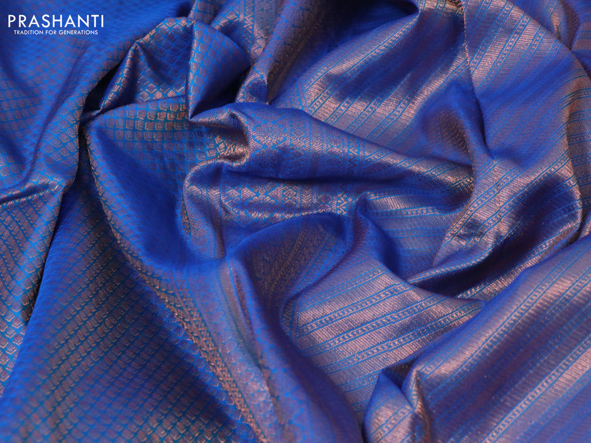 Pure kanchipuram silk saree cs blue with allover zari woven brocade weaves and copper zari woven border