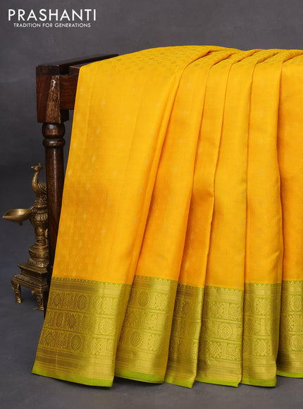 Pure kanchipuram silk saree mango yellow and light green with allover self emboss & zari buttas and zari woven border