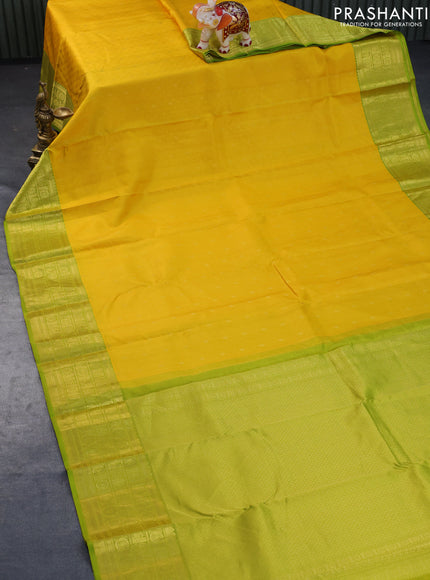 Pure kanchipuram silk saree mango yellow and light green with allover self emboss & zari buttas and zari woven border