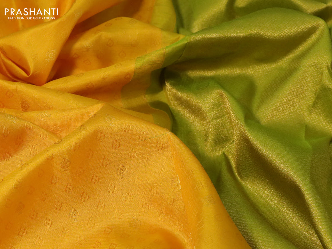 Pure kanchipuram silk saree mango yellow and light green with allover self emboss & zari buttas and zari woven border