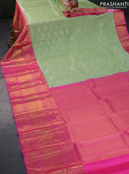 Pure kanchipuram silk saree pista green and pink with allover silver zari woven brocade weaves and long rich zari woven border