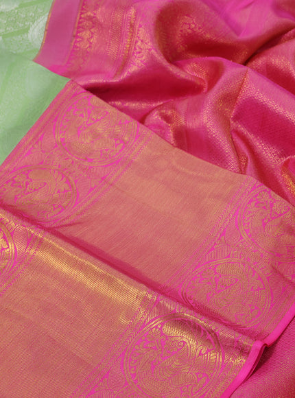 Pure kanchipuram silk saree pista green and pink with allover silver zari woven brocade weaves and long rich zari woven border