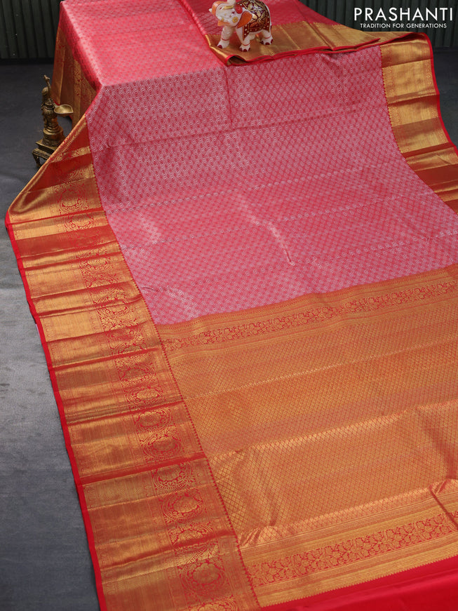 Pure kanchipuram silk saree red with allover silver zari woven brocade weaves and long rich zari woven border