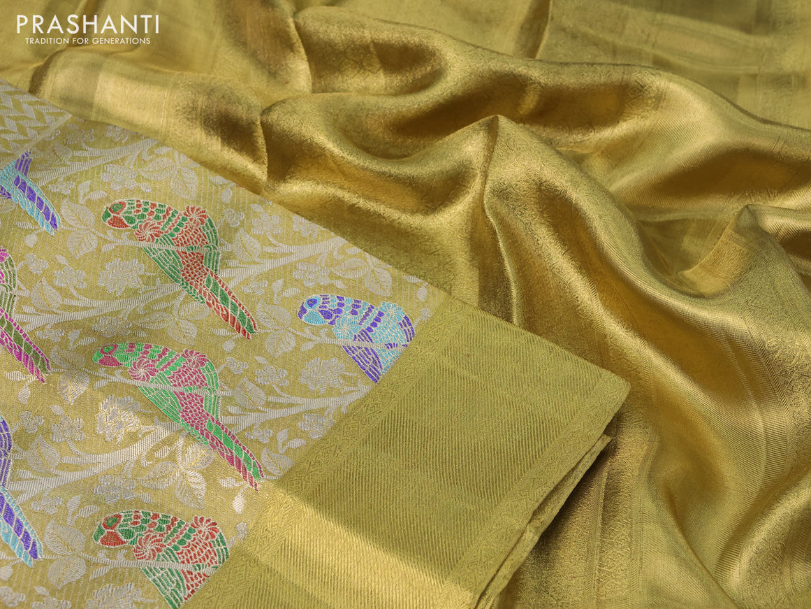 Pure kanchipuram tissue silk saree gold with allover zari woven brocade weaves and long parrot design zari woven border