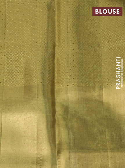 Pure kanchipuram tissue silk saree gold with allover zari woven brocade weaves and long parrot design zari woven border