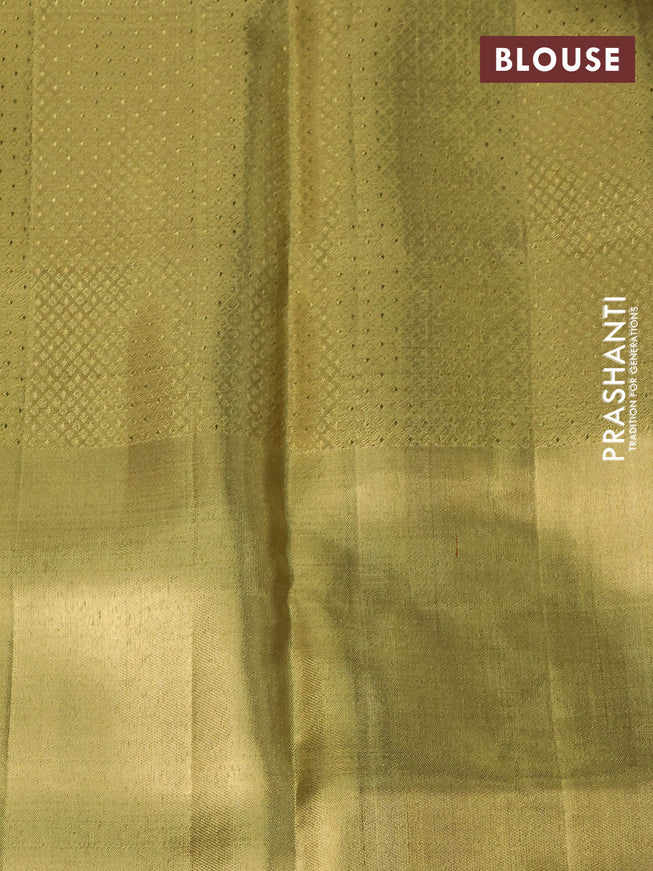 Pure kanchipuram tissue silk saree gold with allover zari woven brocade weaves and long parrot design zari woven border