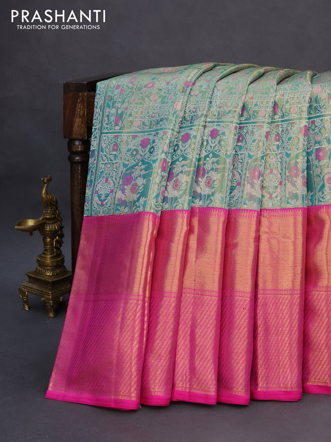 Pure kanchipuram tissue silk saree teal shade shade and pink with allover zari woven brocade weaves and long zari woven border