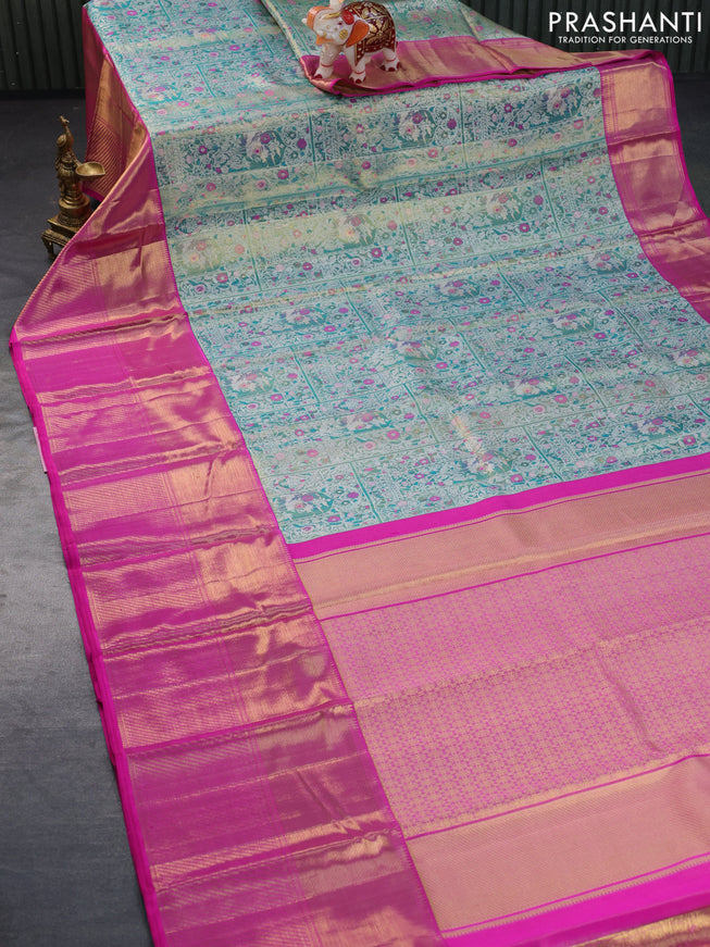 Pure kanchipuram tissue silk saree teal shade shade and pink with allover zari woven brocade weaves and long zari woven border