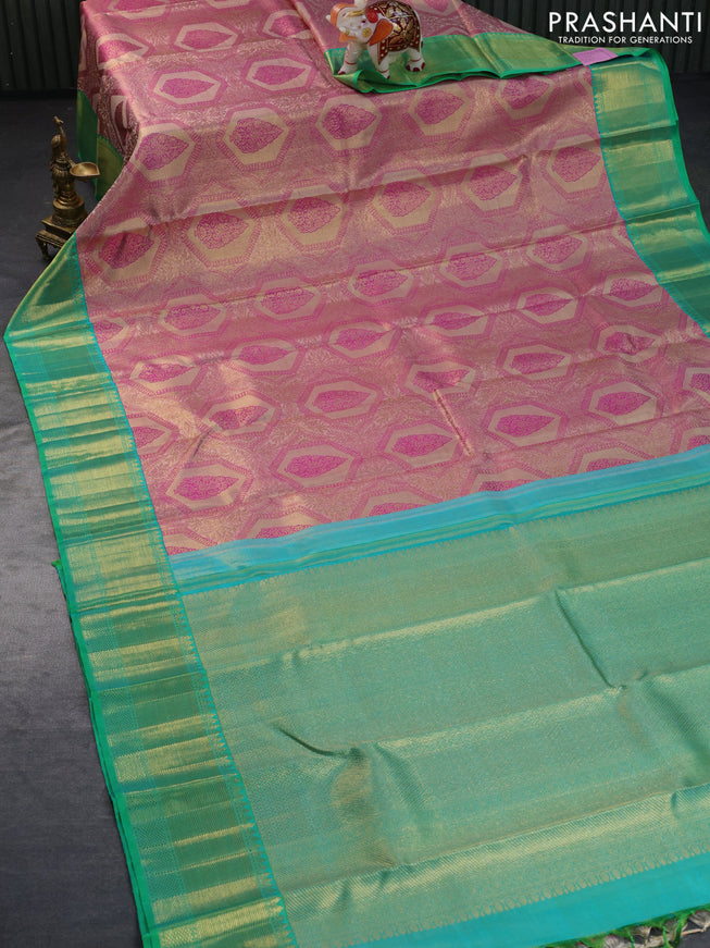 Pure kanchipuram tissue silk saree beige pink and dual shade of teal green with allover zari woven brocade weaves and zari woven border