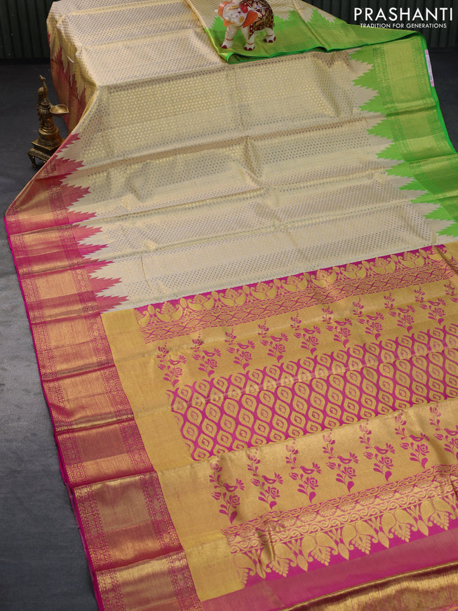 Pure kanchipuram tissue silk saree gold with allover zari weaves and temple design ganga jamuna border