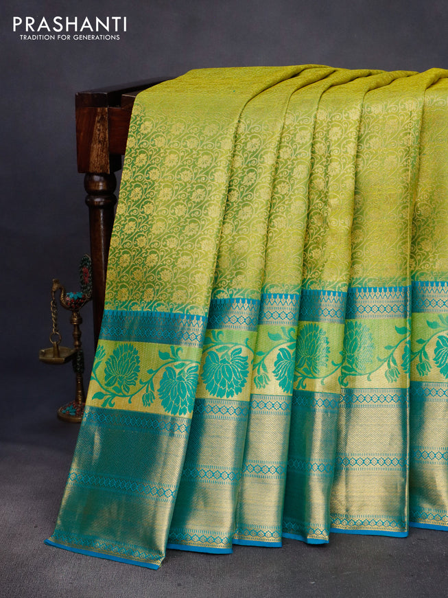 Pure kanchipuram silk saree dual shade of lime green and cs blue with allover zari woven brocade weaves and long thread & zari woven border