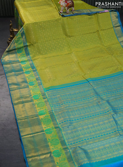 Pure kanchipuram silk saree dual shade of lime green and cs blue with allover zari woven brocade weaves and long thread & zari woven border