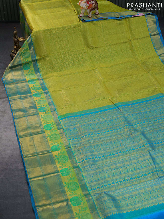 Pure kanchipuram silk saree dual shade of lime green and cs blue with allover zari woven brocade weaves and long thread & zari woven border