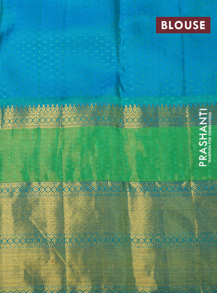 Pure kanchipuram silk saree dual shade of lime green and cs blue with allover zari woven brocade weaves and long thread & zari woven border