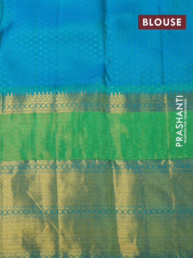 Pure kanchipuram silk saree dual shade of lime green and cs blue with allover zari woven brocade weaves and long thread & zari woven border