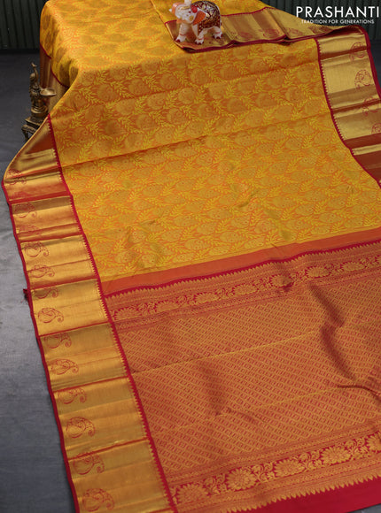 Pure kanchipuram silk saree dark mustard yellow and maroon with allover zari woven brocade weaves and rich paisley zari woven border