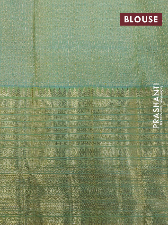 Pure kanchipuram silk saree yellow and dual shade of teal blue with allover zari woven brocade weaves and zari woven border