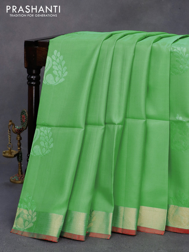 Pure soft silk saree green and reddish pink with zari woven buttas and zari woven border